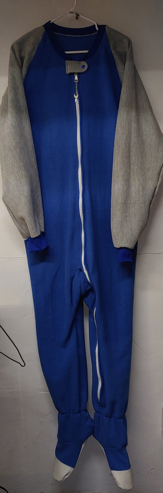 Vintage fleece footie pajama, custom made to your measurements. Blue body and legs, with grey sleeves, and a locking white zipper down the front.